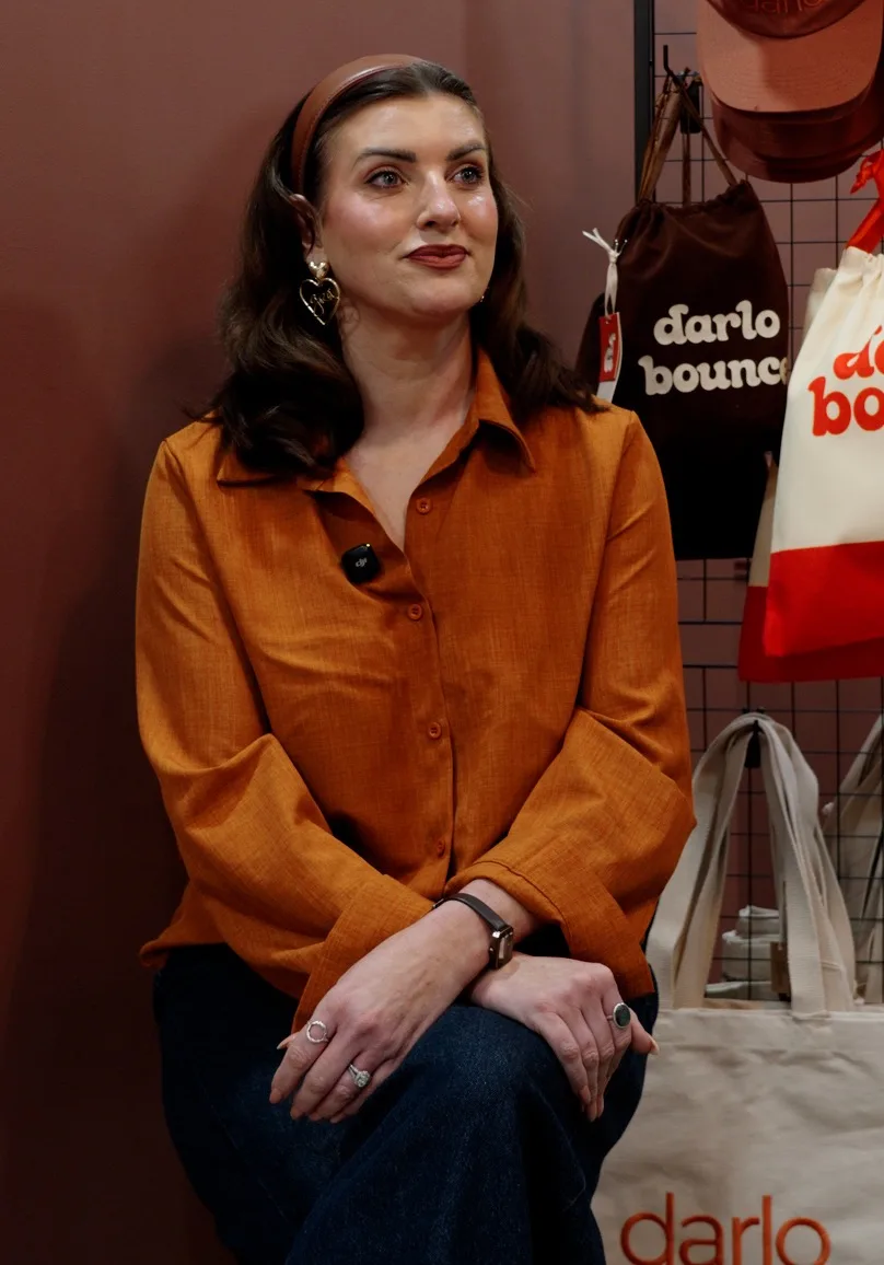 Katrina, owner of Darlo, sitting in her salon
