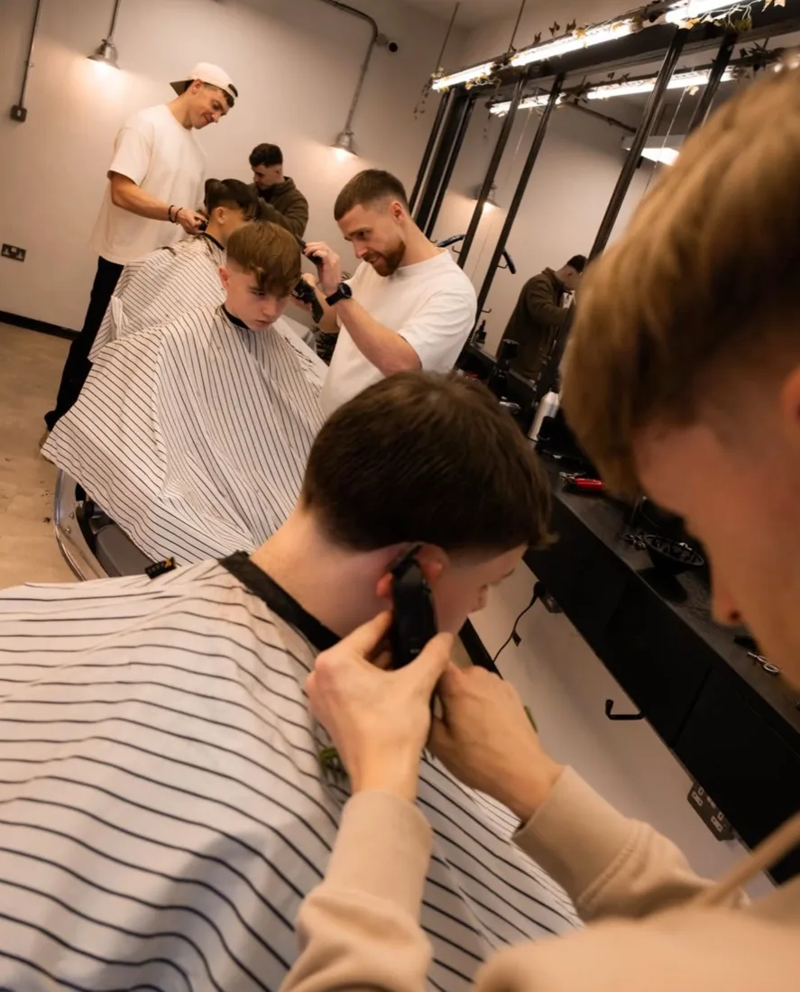 Barbers at work at Jiggs & Co